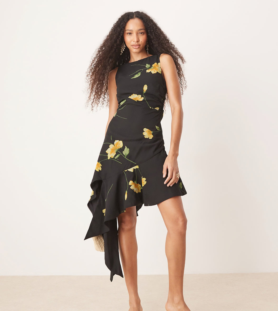 Asymmetric frill hem midi dress in black and yellow floral print